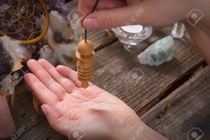 Palm reading with pendulum